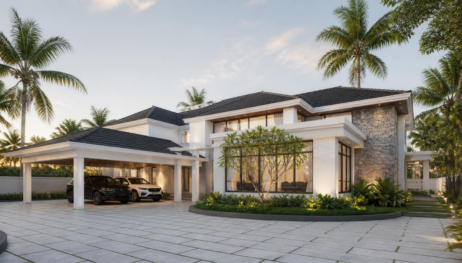 Luxury white villa at dusk with charcoal tiled roofs, stone feature wall and covered carport